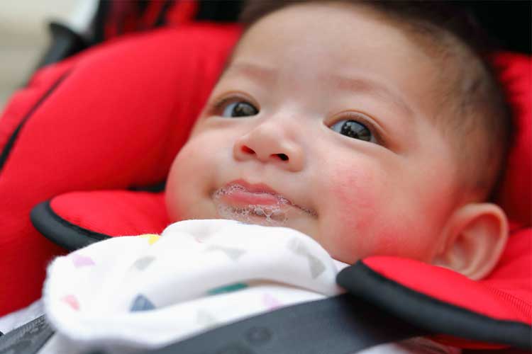 Baby blowing bubbles 