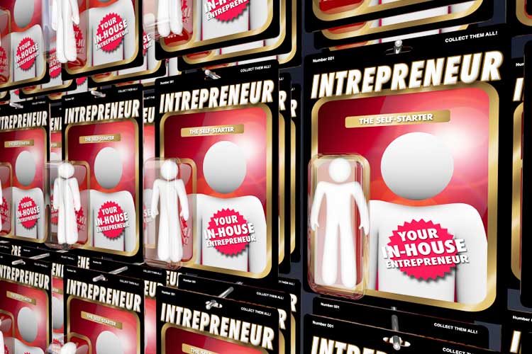 Packaged white figurines on a store shelf with 'Intrepreneur' label