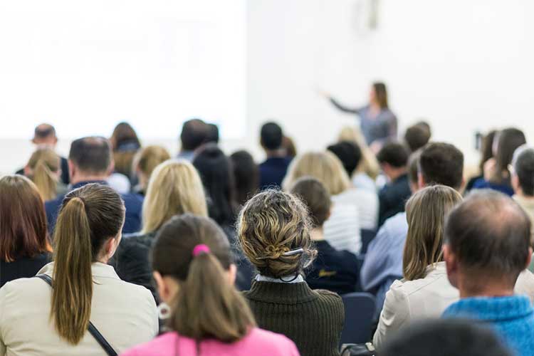 Crowd of people at a conference session